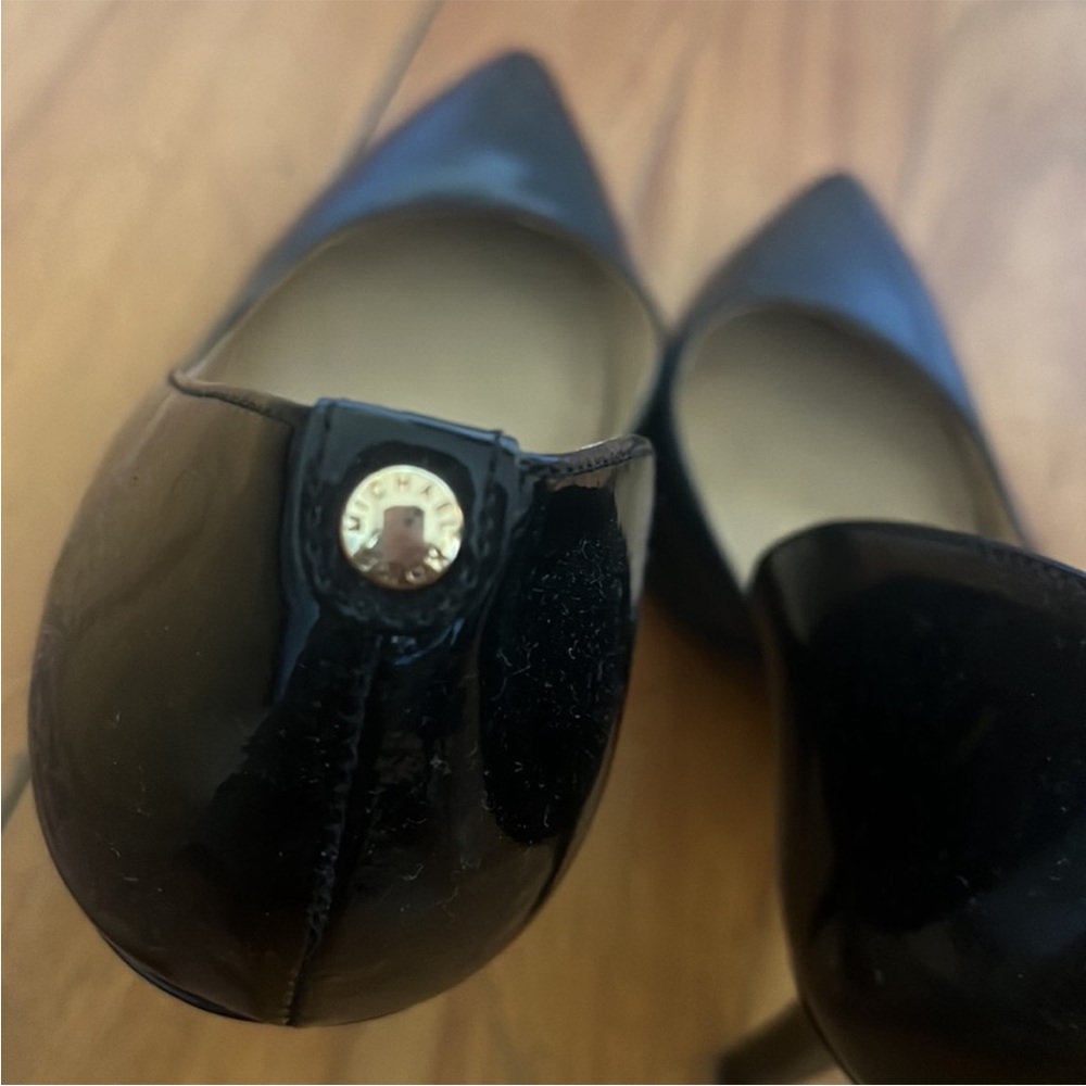 Michael Kors patent leather pumps